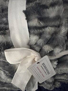 Berkshire Gray & White Faux Fur Throw,Flipside is a Plush Solid Gray Velvet.